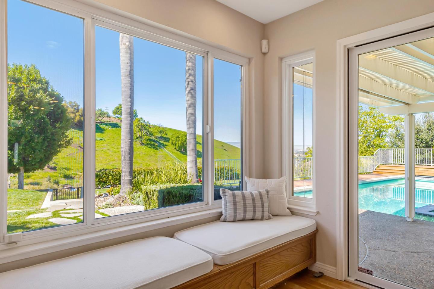 Utopia Place San Jose, CA 95127 - Photo 7 of 35 a bedroom with furniture and large windows