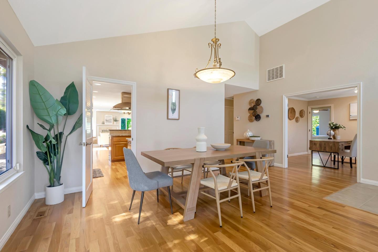Utopia Place San Jose, CA 95127 - Photo 8 of 35 a view of a dining room with furniture wooden floor and chandelier
