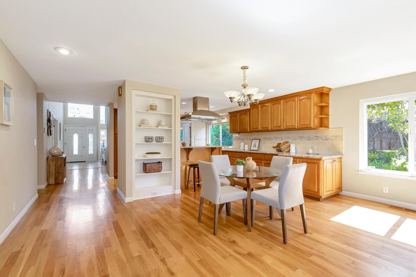 Utopia Place San Jose, CA 95127 - Photo 9 of 35 a view of a dining room with furniture and wooden floor