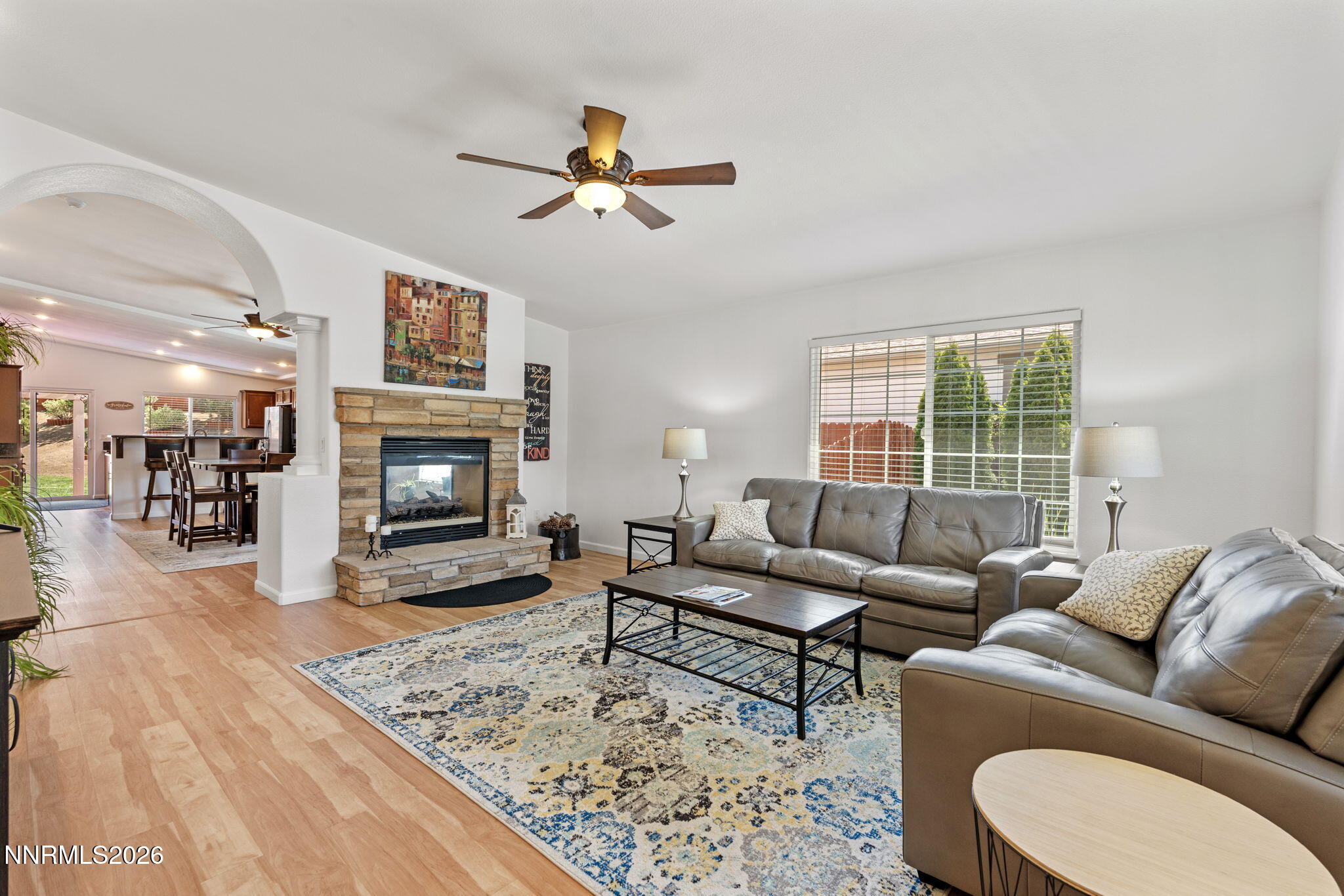 18324 Panda Bear Court Reno, NV 89508 - Photo 5 of 44 a living room with furniture and a fireplace