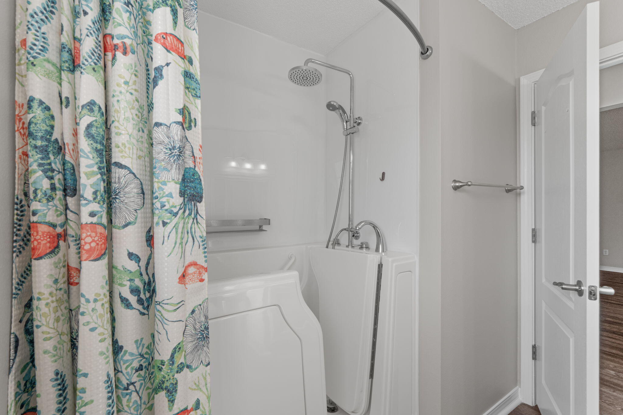 8134 Menorca Street Navarre, FL 32566 - Photo 27 of 54 a bathroom with a shower and a curtain