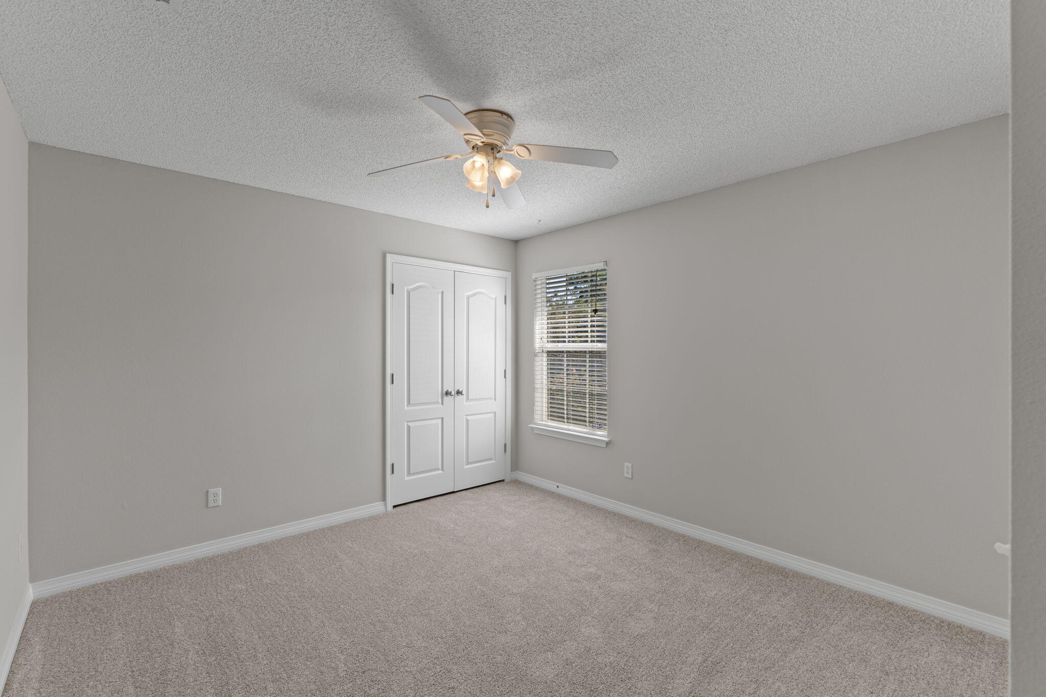 8134 Menorca Street Navarre, FL 32566 - Photo 30 of 54 a view of an empty room with a window