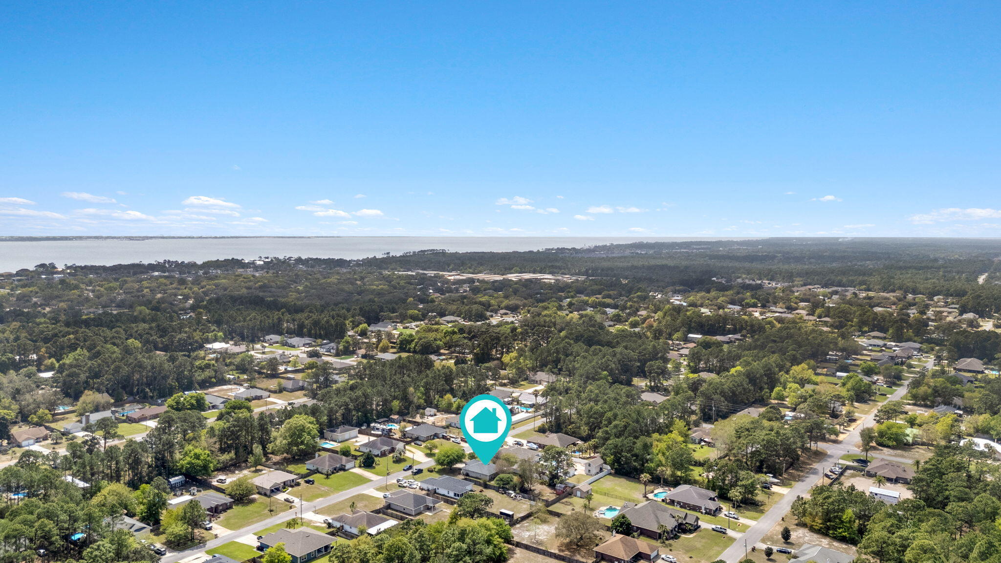 8134 Menorca Street Navarre, FL 32566 - Photo 49 of 54 an aerial view of a city