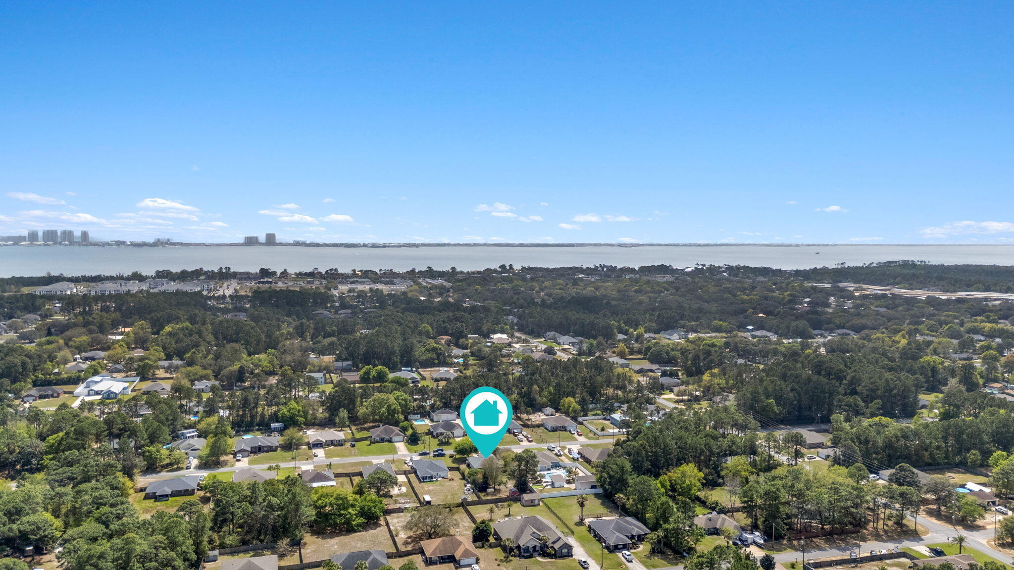 8134 Menorca Street Navarre, FL 32566 - Photo 50 of 54 an aerial view of a city