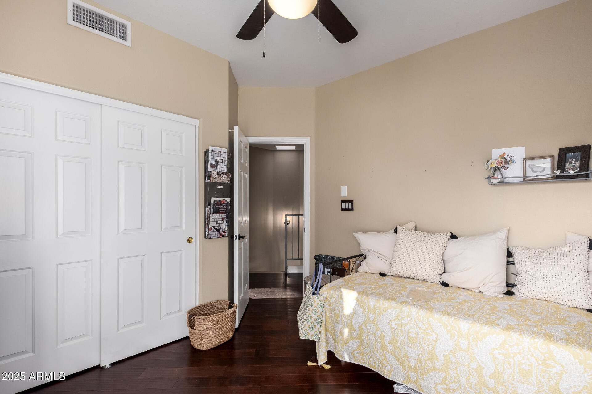 8818 South 51st Street, Unit 1 Phoenix, AZ 85044 - Photo 17 of 26 a bedroom with a bed and a lamp