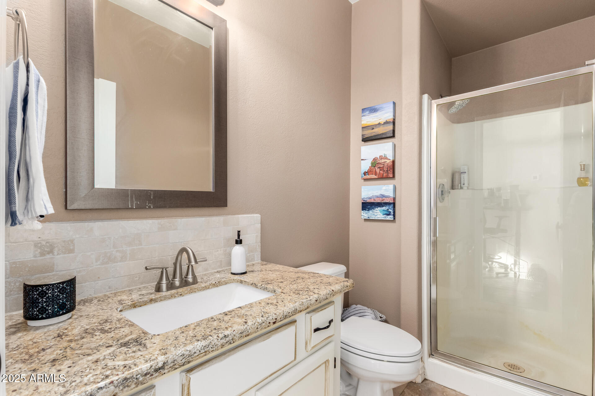 8818 South 51st Street, Unit 1 Phoenix, AZ 85044 - Photo 18 of 26 a bathroom with a granite countertop sink toilet and shower