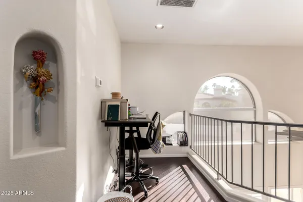 a view of a livingroom with furniture and front door