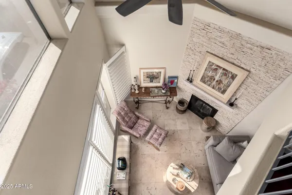 a view of living room with furniture and rug