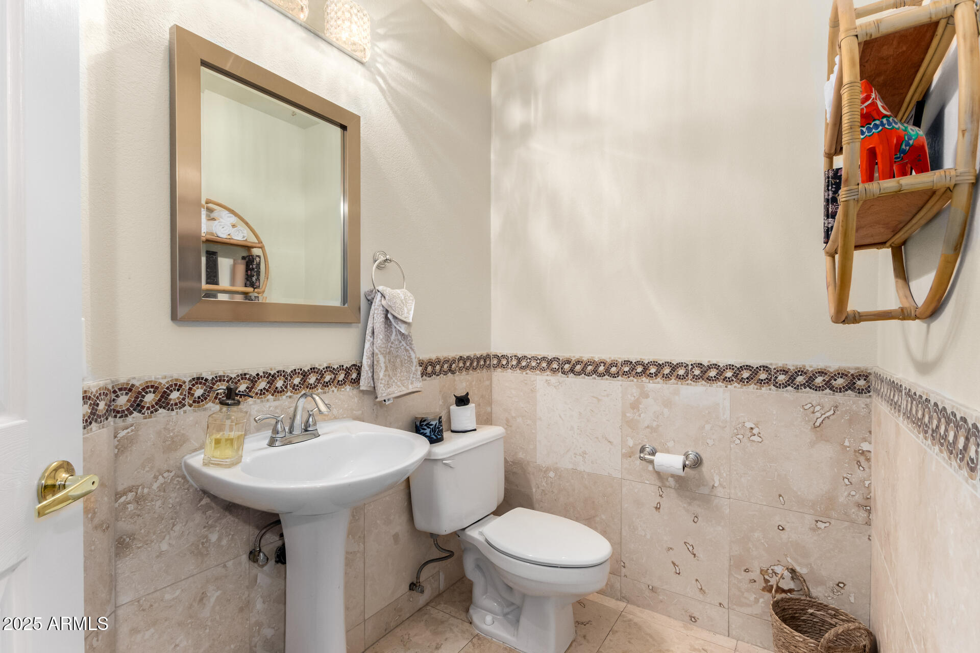 8818 South 51st Street, Unit 1 Phoenix, AZ 85044 - Photo 21 of 26 a bathroom with a sink toilet and a mirror