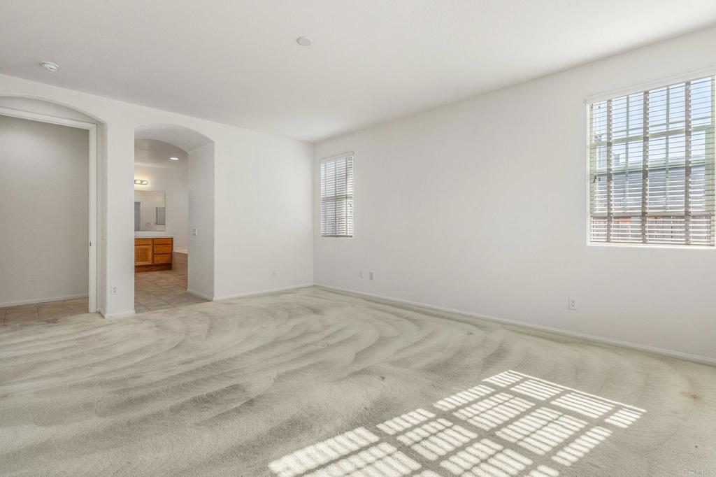 564 Echo Lane San Marcos, CA 92078 - Photo 21 of 27 a view of an empty room and a window
