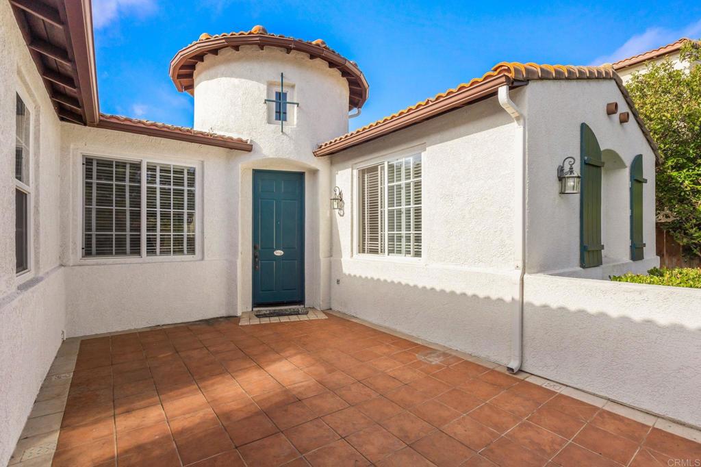 564 Echo Lane San Marcos, CA 92078 - Photo 4 of 27 a front view of a house with a garage