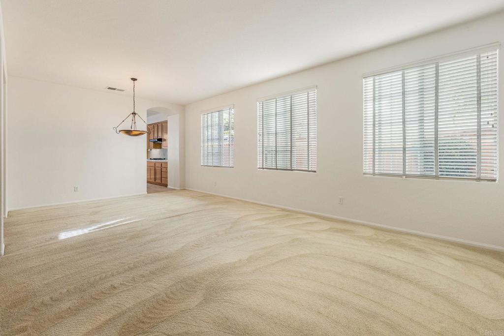 564 Echo Lane San Marcos, CA 92078 - Photo 6 of 27 an empty room with windows
