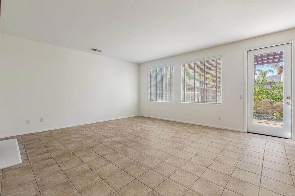 564 Echo Lane San Marcos, CA 92078 - Photo 8 of 27 a view of an empty room with a window