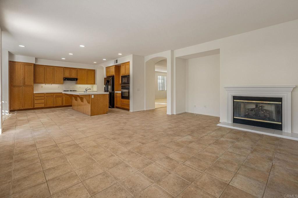 564 Echo Lane San Marcos, CA 92078 - Photo 9 of 27 a view of kitchen with furniture and refrigerator