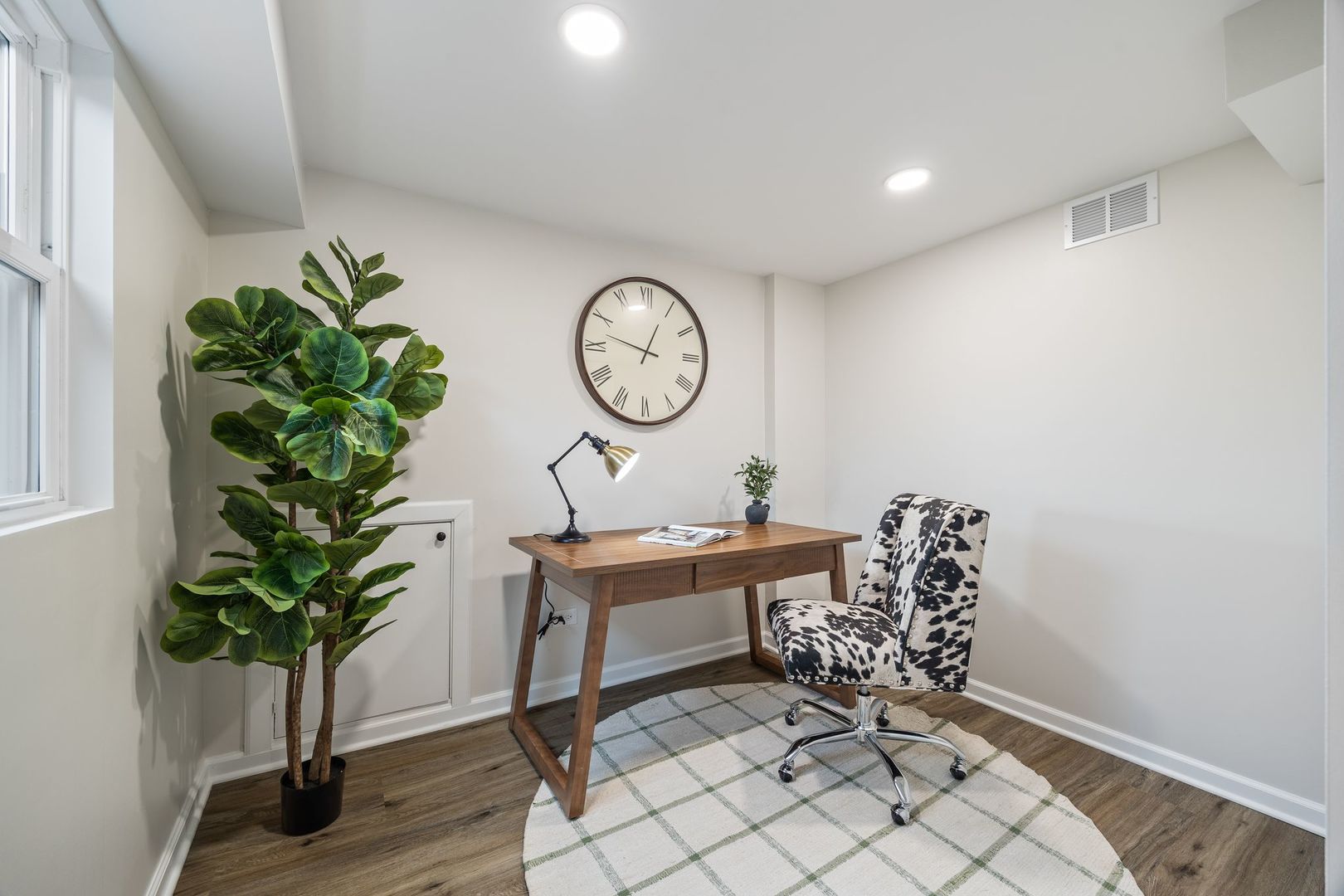 6791 Church Street Hanover Park, IL 60133 - Photo 18 of 24 a workspace with furniture and a potted plant