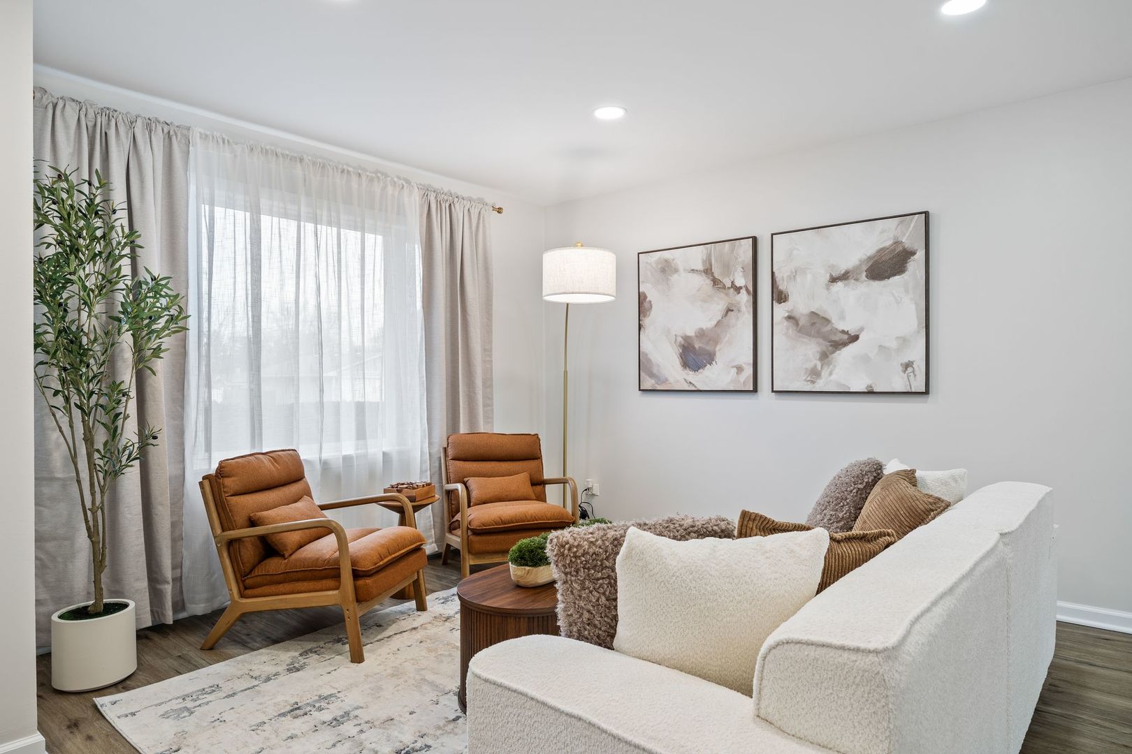 6791 Church Street Hanover Park, IL 60133 - Photo 2 of 24 a living room with furniture and a large window