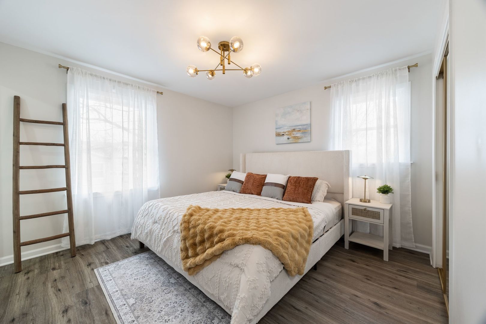 6791 Church Street Hanover Park, IL 60133 - Photo 9 of 24 a bedroom with a bed and a window