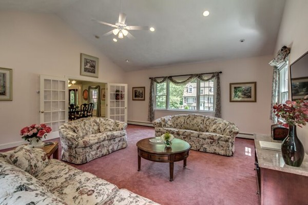 12 Ogunquit Road Wilmington, MA 01887 - Photo 13 of 27 a living room with furniture and a large window