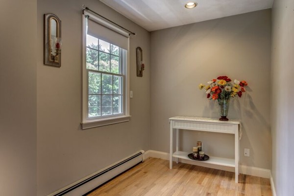 12 Ogunquit Road Wilmington, MA 01887 - Photo 21 of 27 a view of a room that has a window and wooden floor