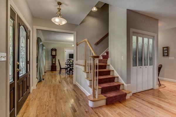 12 Ogunquit Road Wilmington, MA 01887 - Photo 3 of 27 a view of entryway and hall with wooden floor