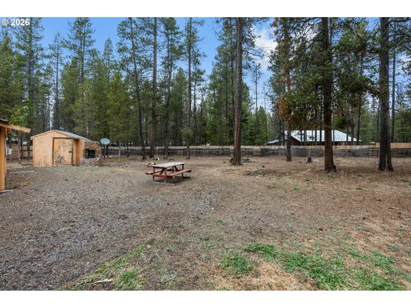 a view of a park with swings and slides