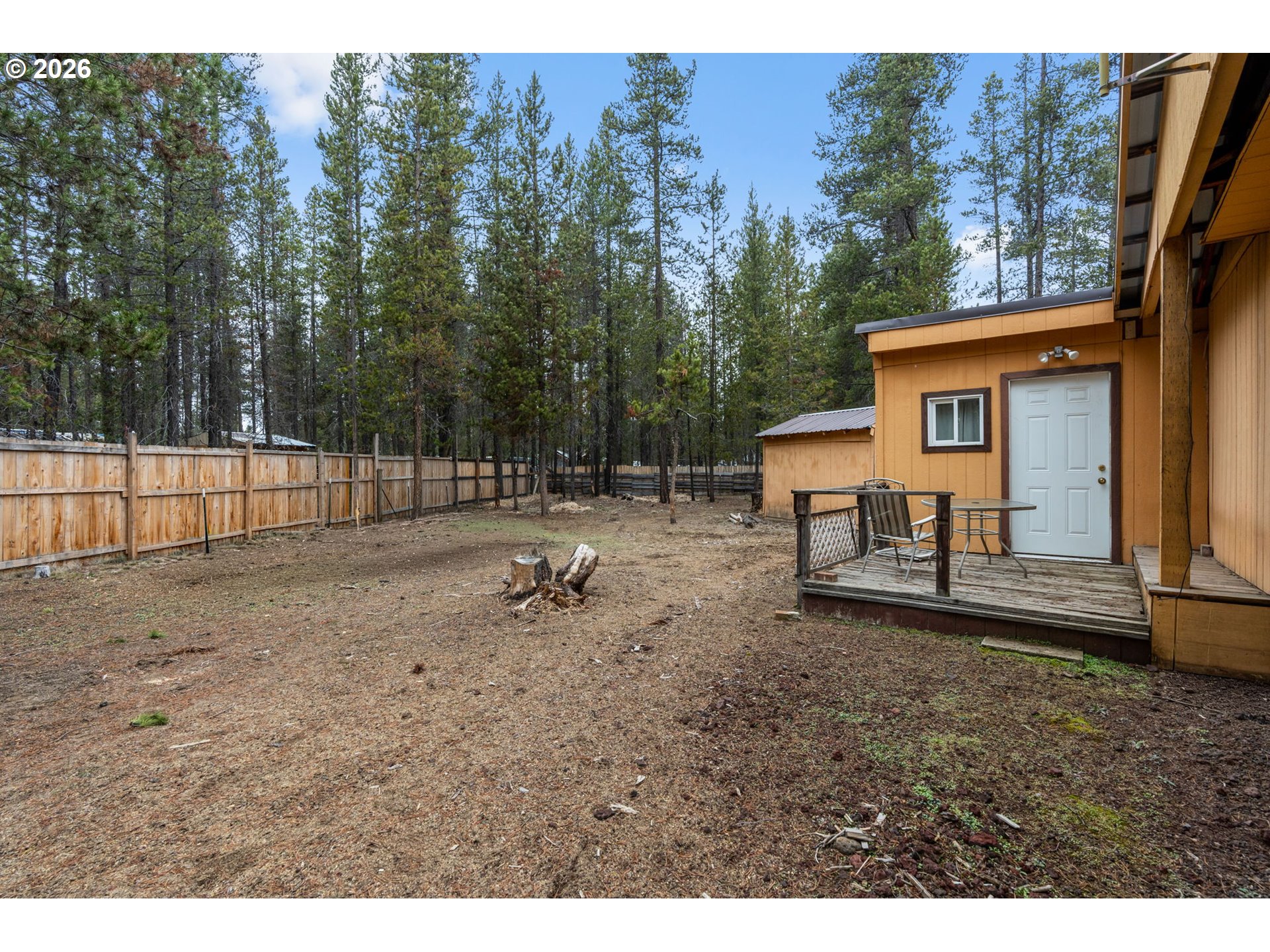 17114 Faun Lane La Pine, OR 97739 - Photo 26 of 28 a backyard of a house with table and chairs