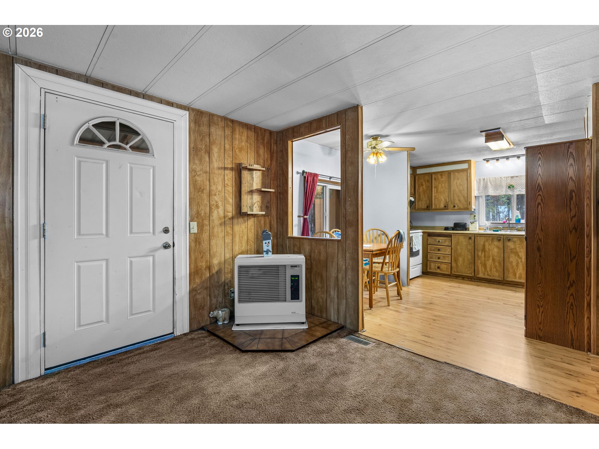 17114 Faun Lane La Pine, OR 97739 - Photo 6 of 28 a living room with stainless steel appliances kitchen island granite countertop furniture and a kitchen view
