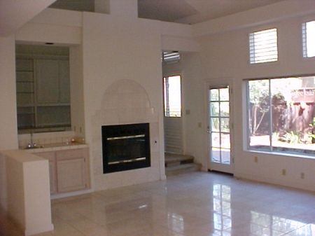 201 Majorca Drive San Ramon, CA 94582 - Photo 2 of 6 an empty room with windows and fireplace