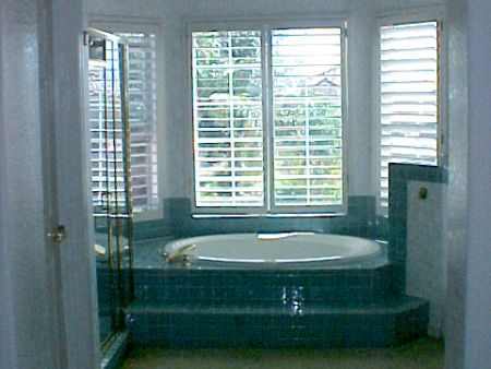 201 Majorca Drive San Ramon, CA 94582 - Photo 6 of 6 a bath tub sitting in a bathroom next to a window