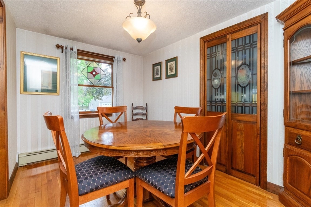 118 Bruce Road Walpole, MA 02081 - Photo 9 of 30 a dining room with furniture and window