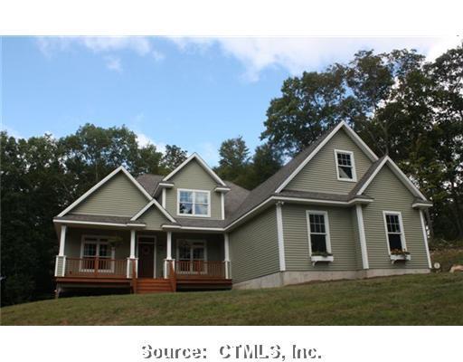 9 Fanning Road Ledyard, CT 06339 - Photo 1 of 1 a front view of a house with a yard
