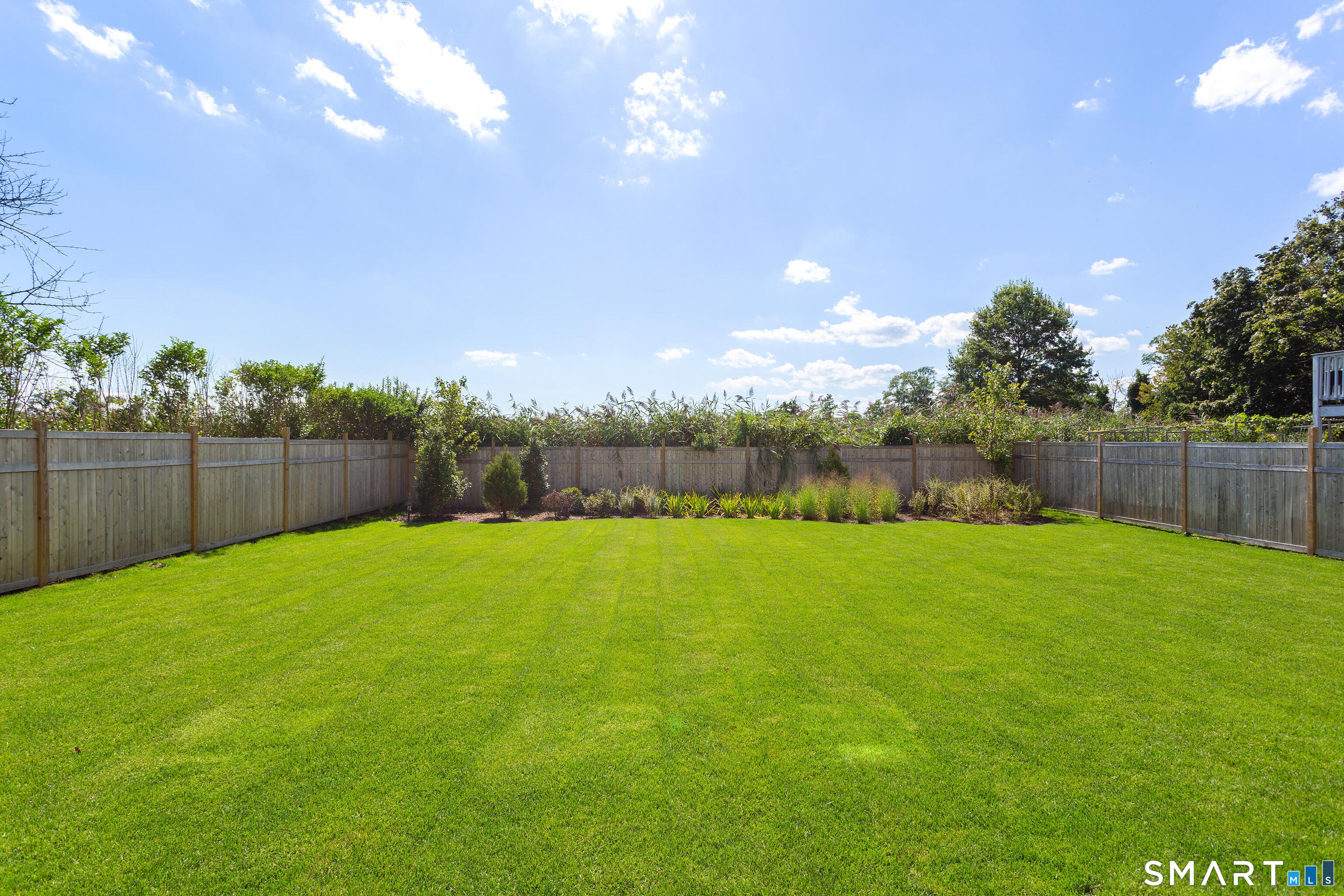 997 Reef Road Fairfield, CT 06824 - Photo 15 of 15 a view of a backyard