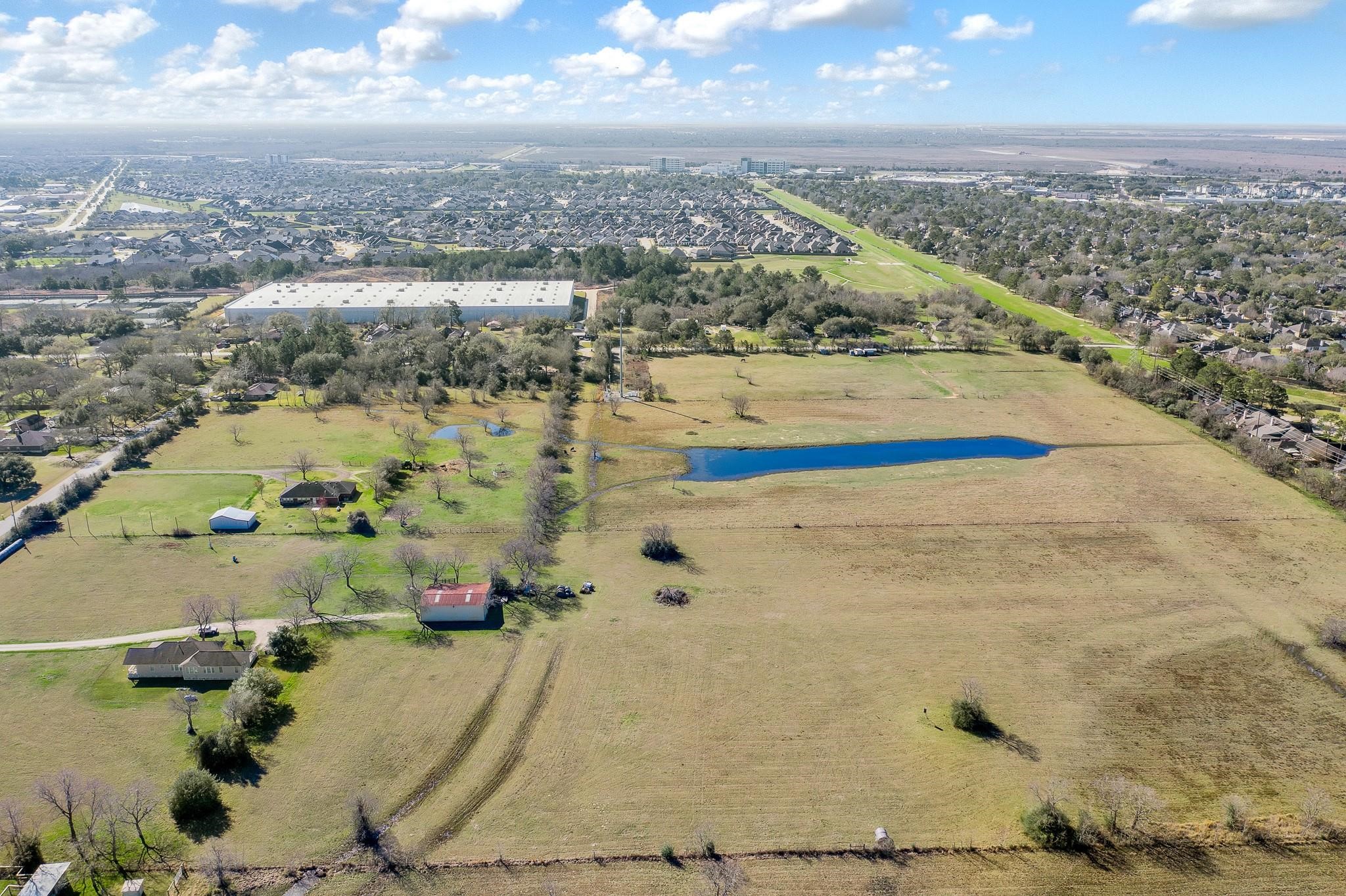 15815 Merle Road Cypress, TX 77433 - Photo 11 of 16 an aerial view of residential houses with outdoor space