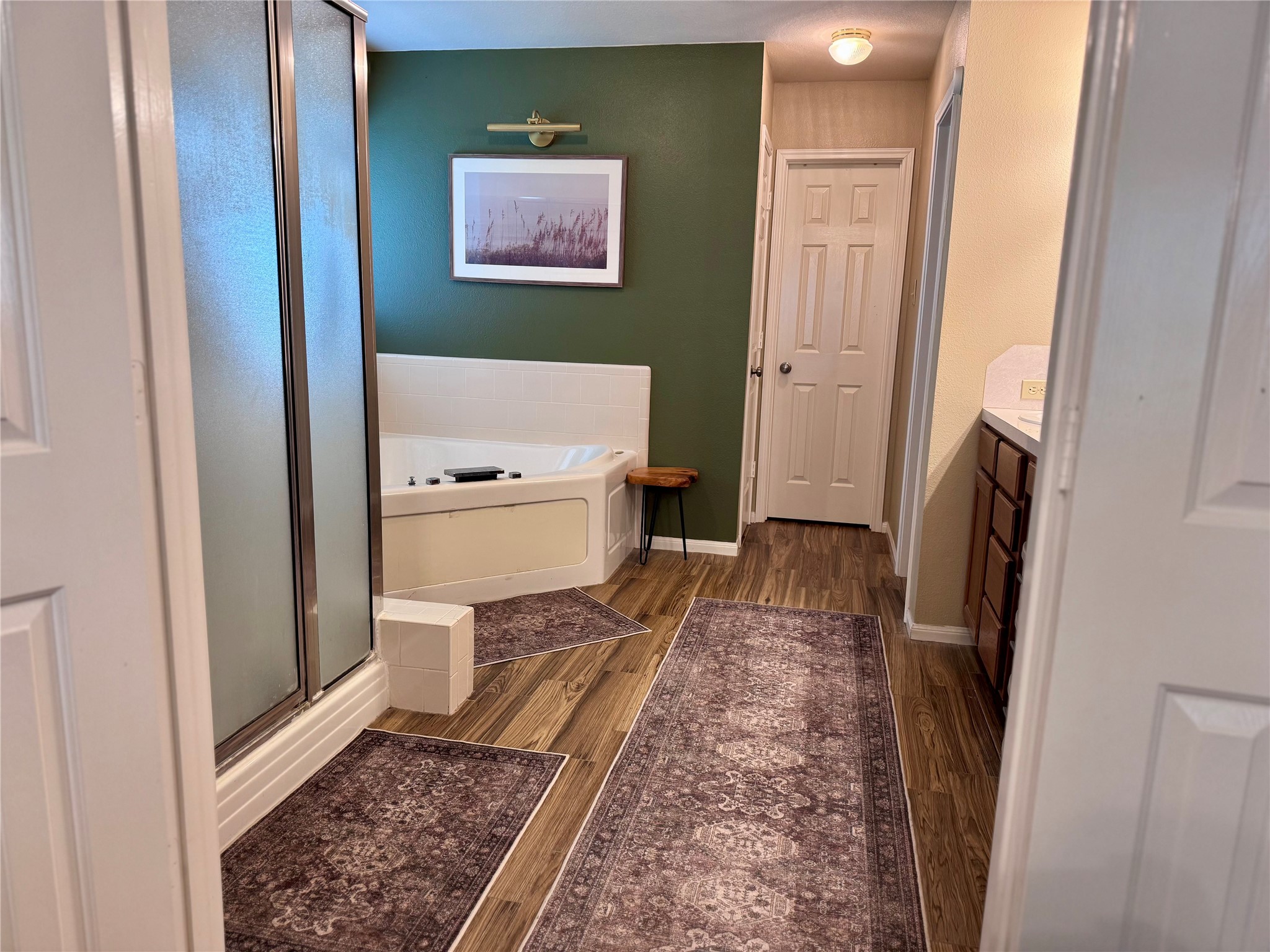 15815 Merle Road Cypress, TX 77433 - Photo 15 of 16 a bathroom with a sink and a mirror