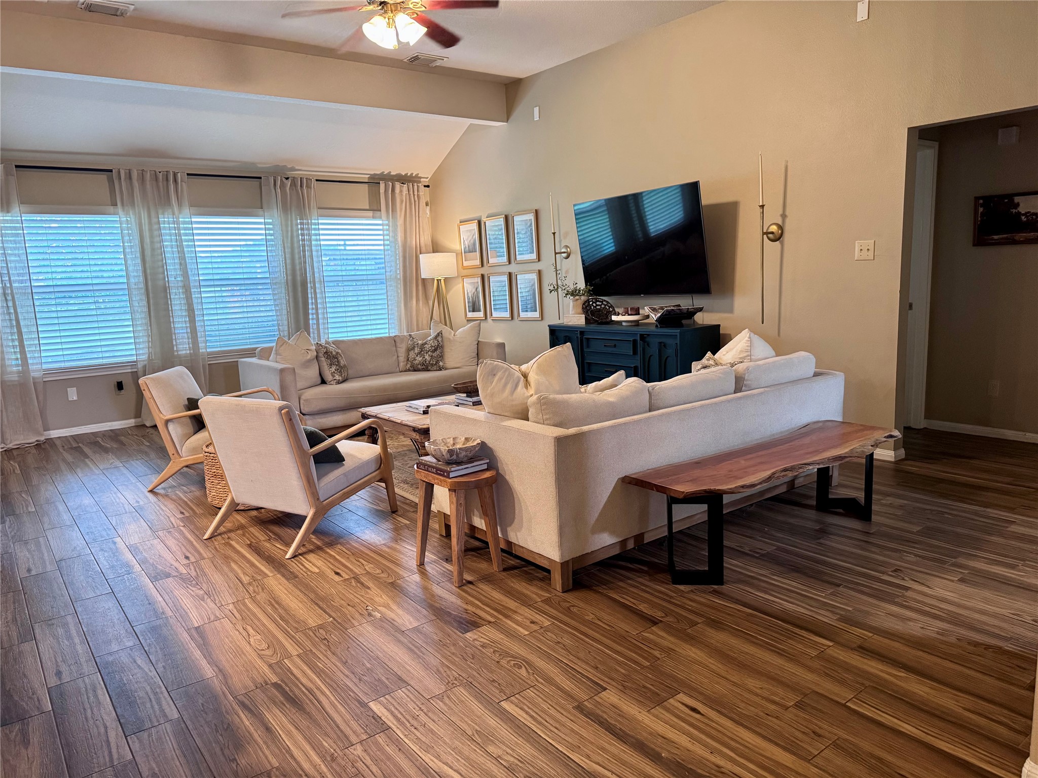 15815 Merle Road Cypress, TX 77433 - Photo 4 of 16 a living room with furniture and a flat screen tv