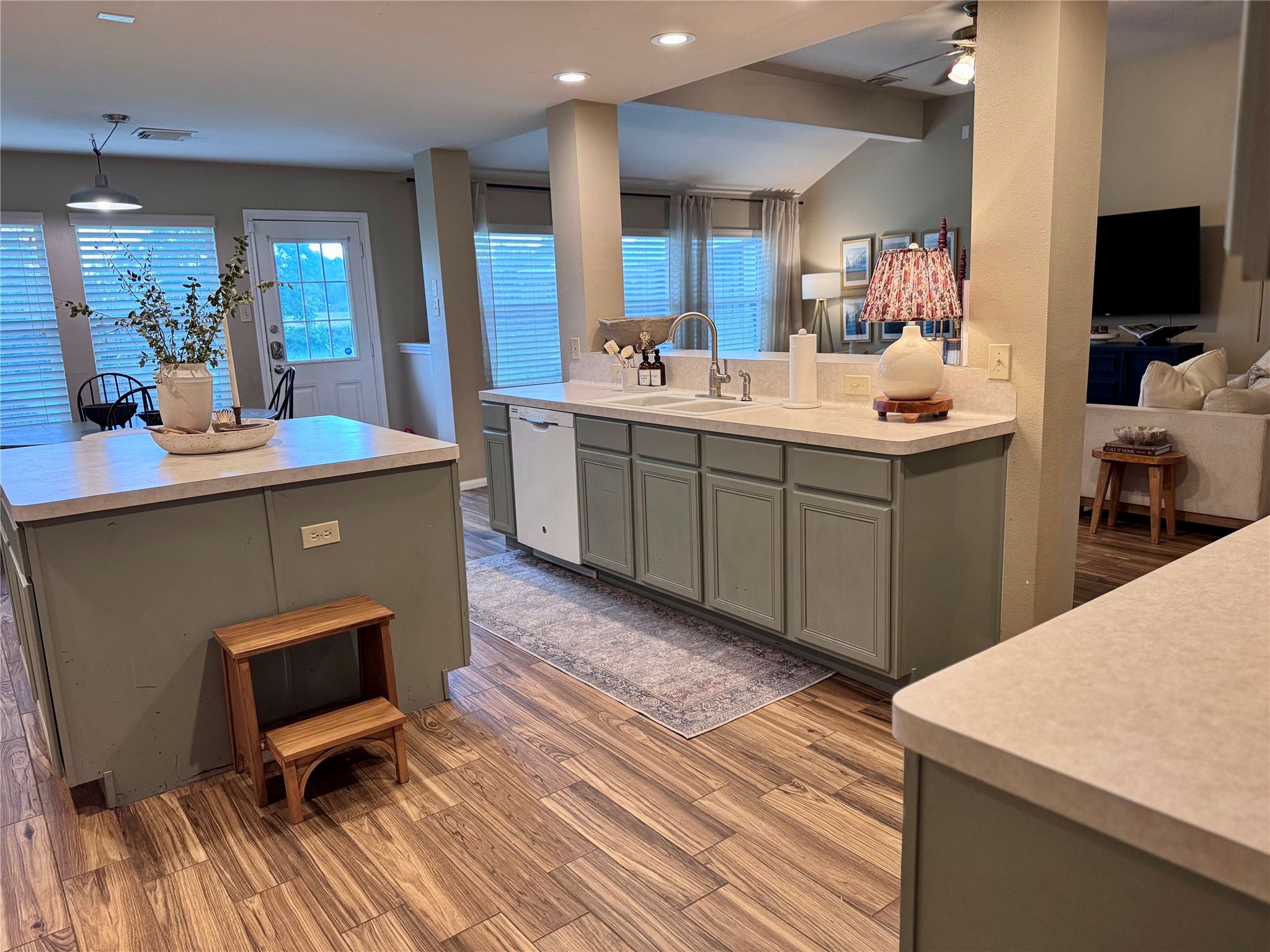 15815 Merle Road Cypress, TX 77433 - Photo 6 of 16 a kitchen with a sink appliances and cabinets