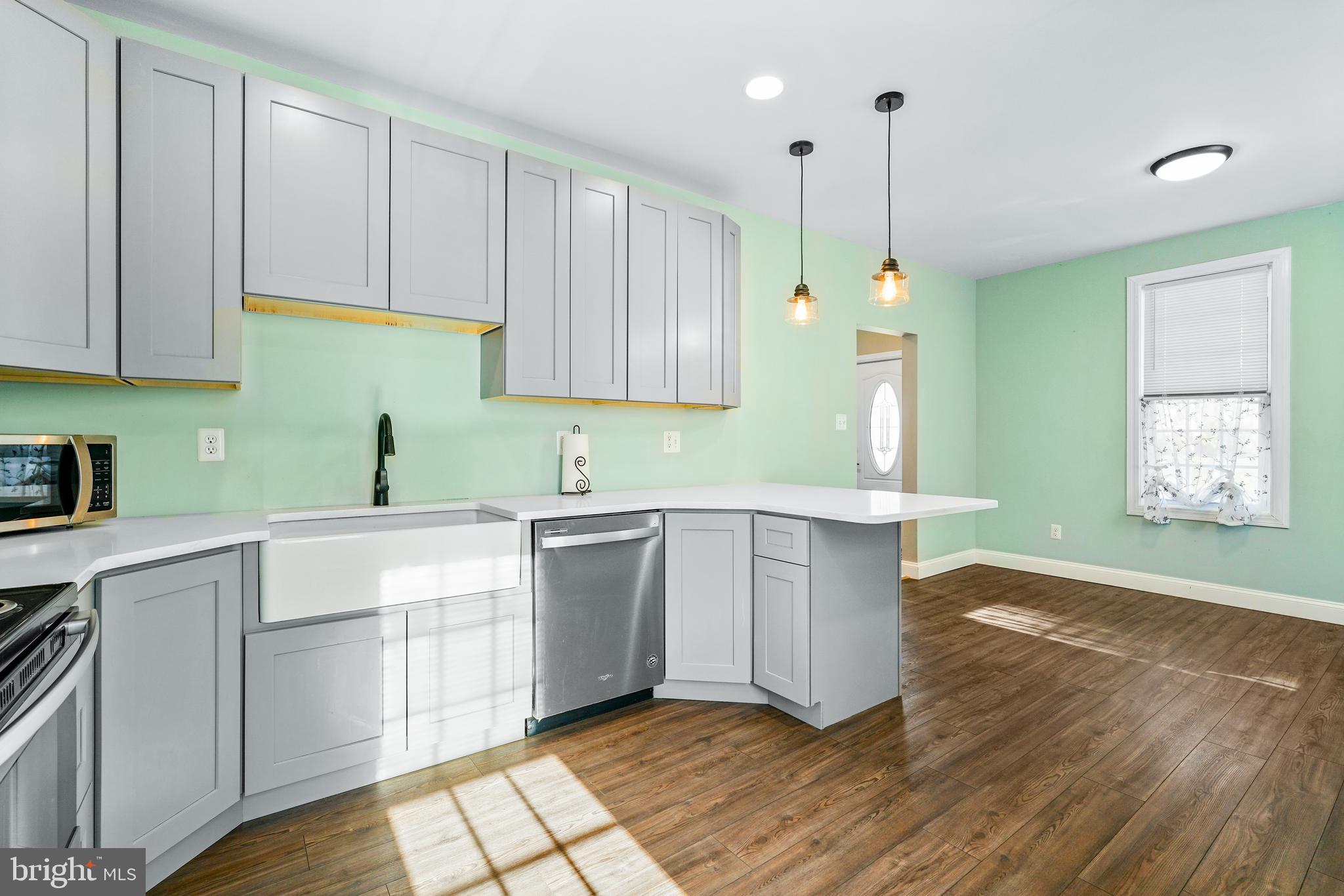 132 South Queen Street Rising Sun, MD 21911 - Photo 11 of 29 a kitchen with a sink cabinets and window