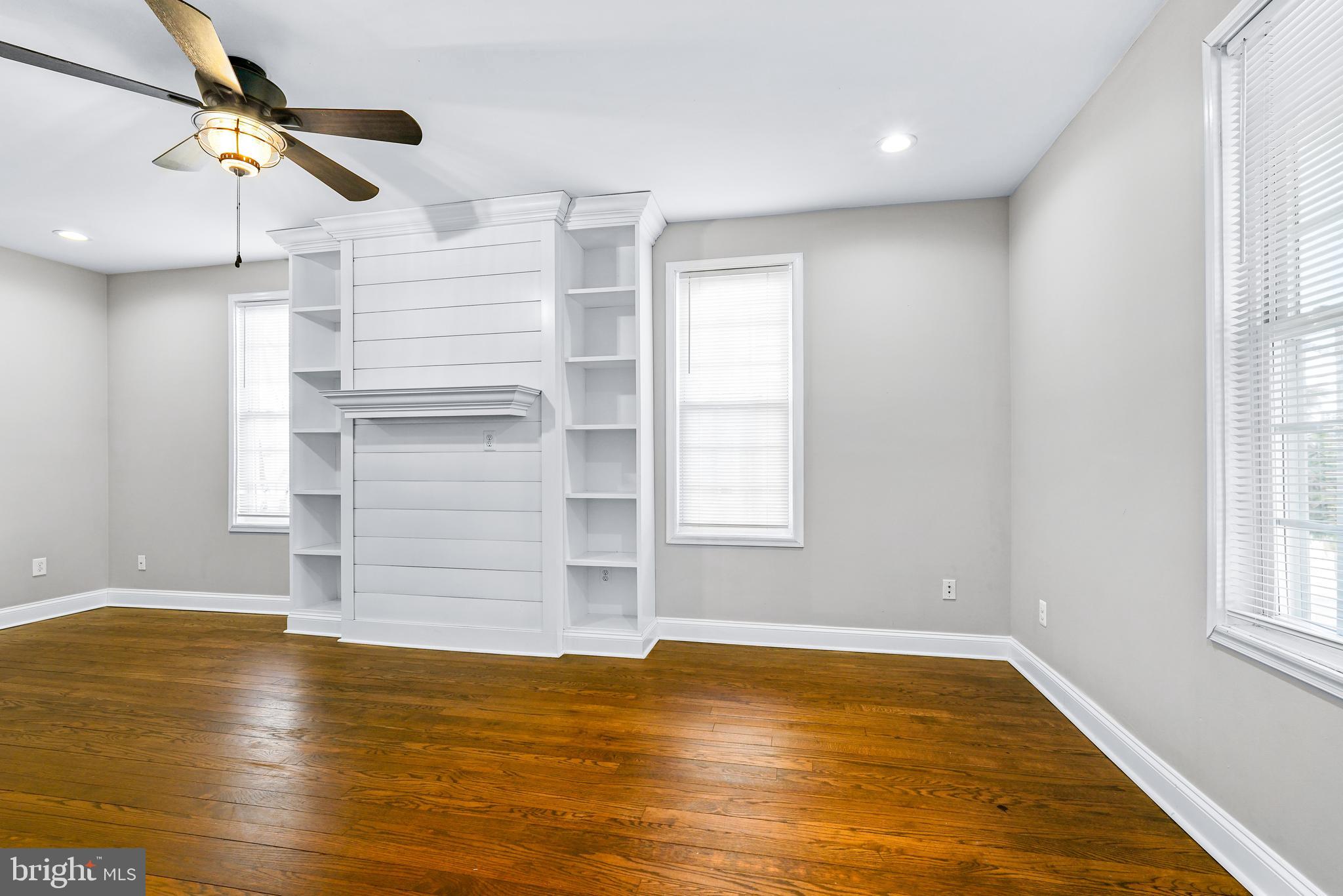 132 South Queen Street Rising Sun, MD 21911 - Photo 13 of 29 a view of empty room with wooden floor and window
