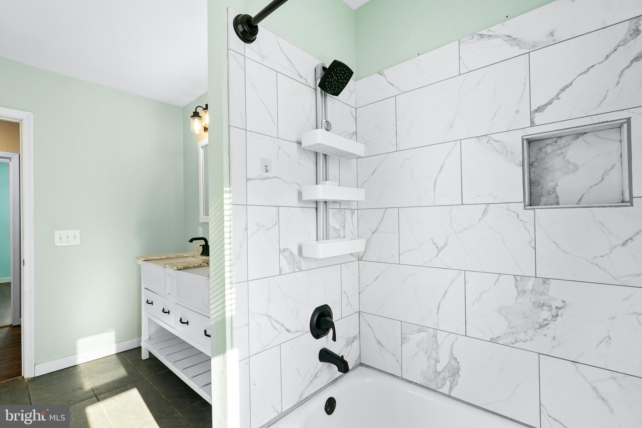132 South Queen Street Rising Sun, MD 21911 - Photo 19 of 29 a bathroom with a tub and a shower
