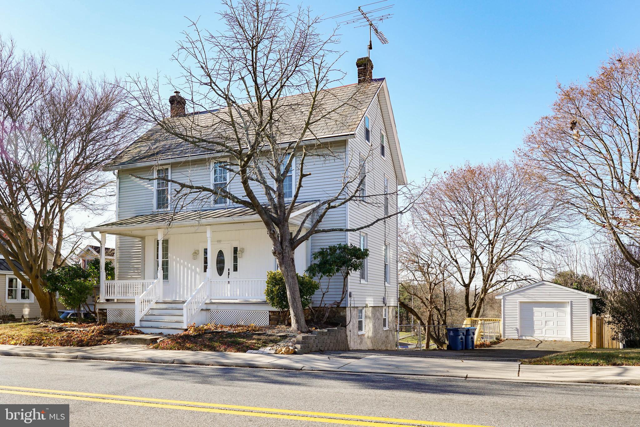 132 South Queen Street Rising Sun, MD 21911 - Photo 2 of 29 a view of a white house with a large tree of the house