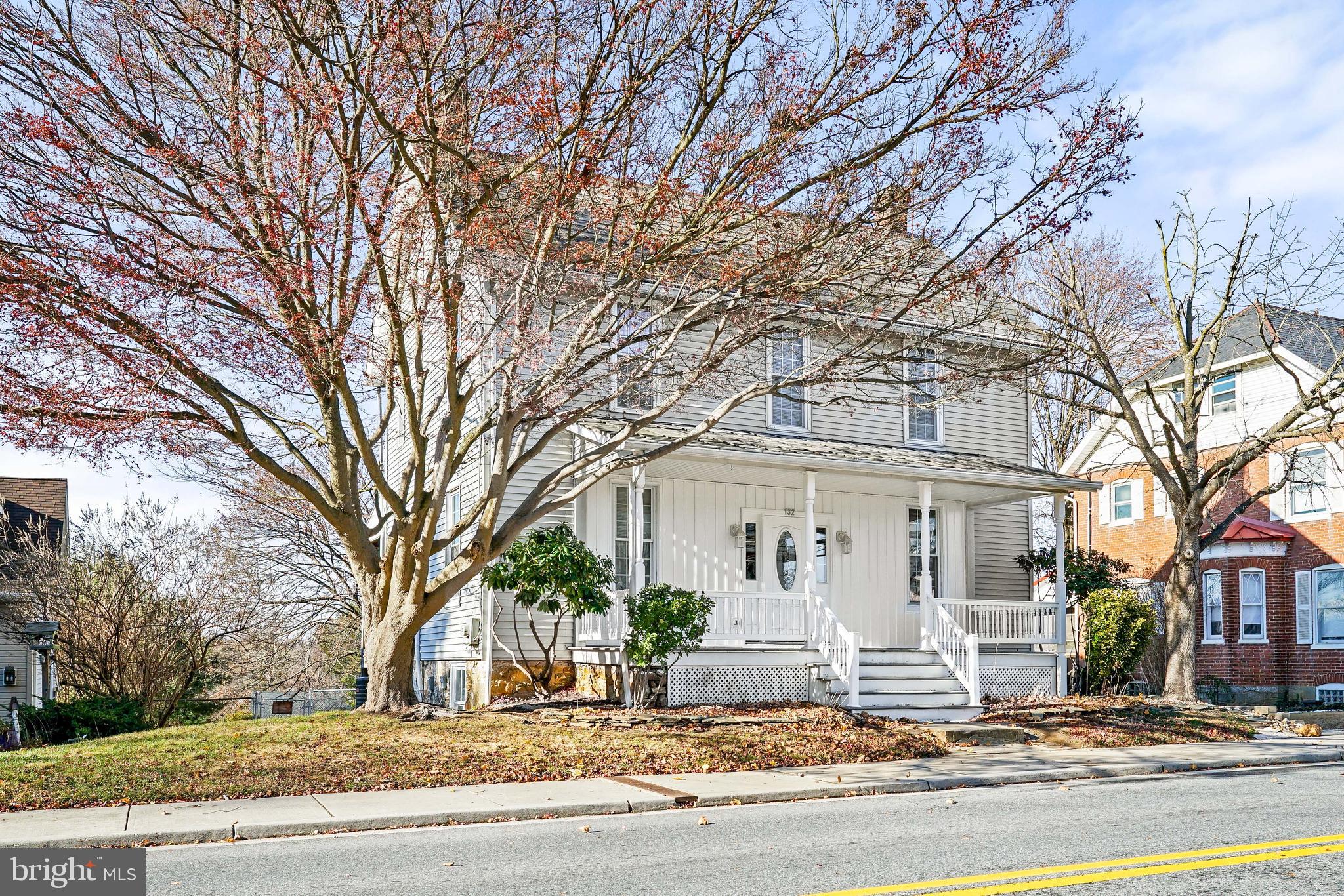 132 South Queen Street Rising Sun, MD 21911 - Photo 3 of 29 a front view of house with yard and trees around