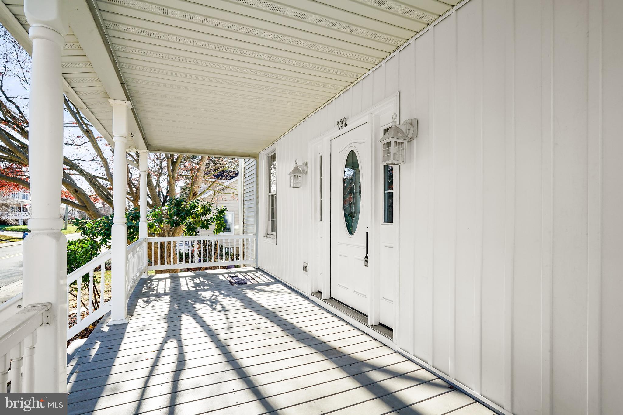 132 South Queen Street Rising Sun, MD 21911 - Photo 4 of 29 a view of a porch with wooden floor