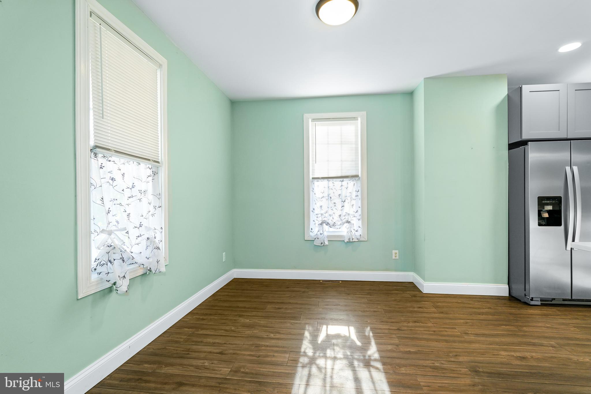132 South Queen Street Rising Sun, MD 21911 - Photo 7 of 29 a view of empty room with wooden floor and fan