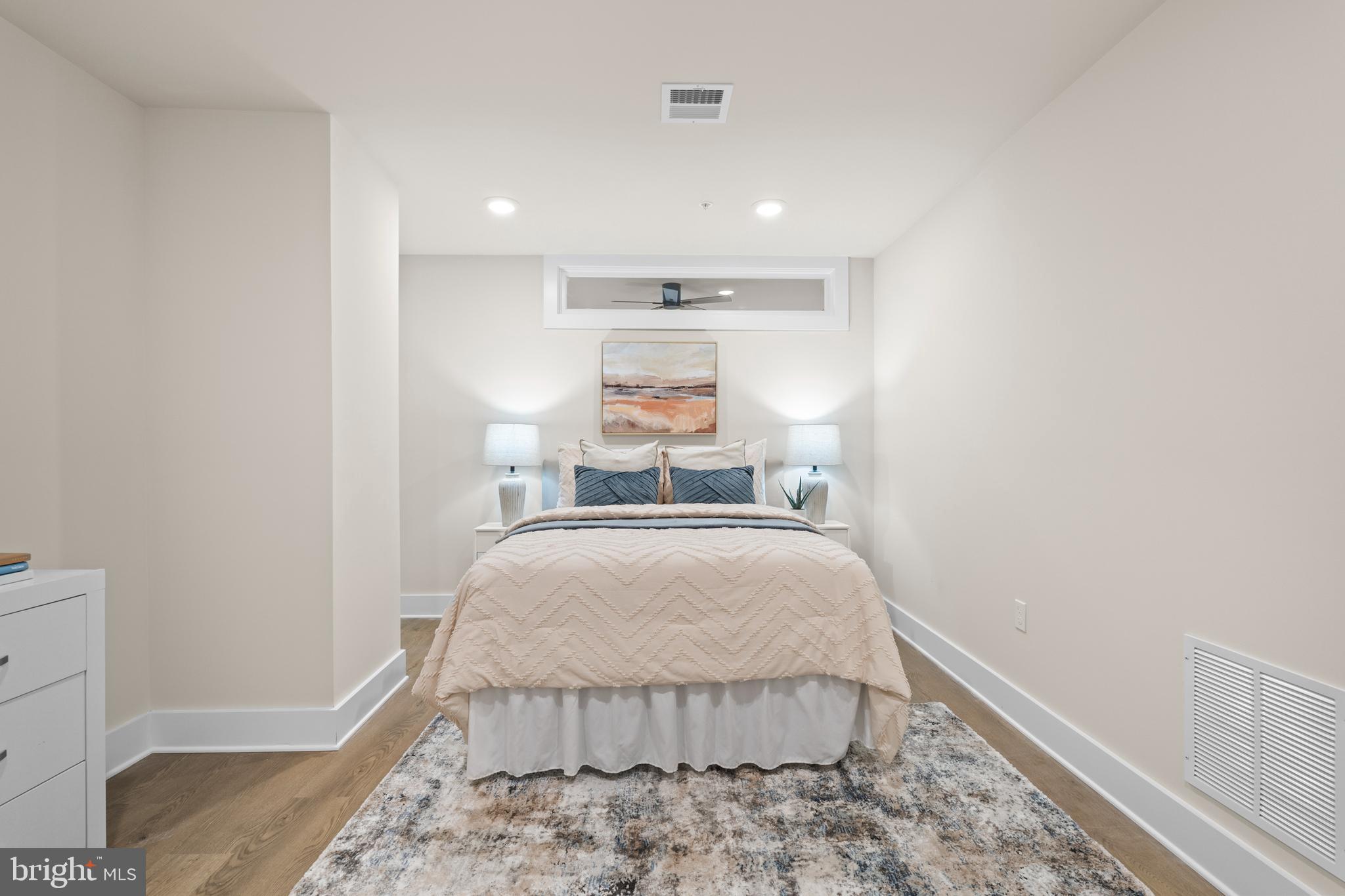 30 West Broad Street Souderton, PA 18964 - Photo 16 of 38 a bed room with a bed and a large window