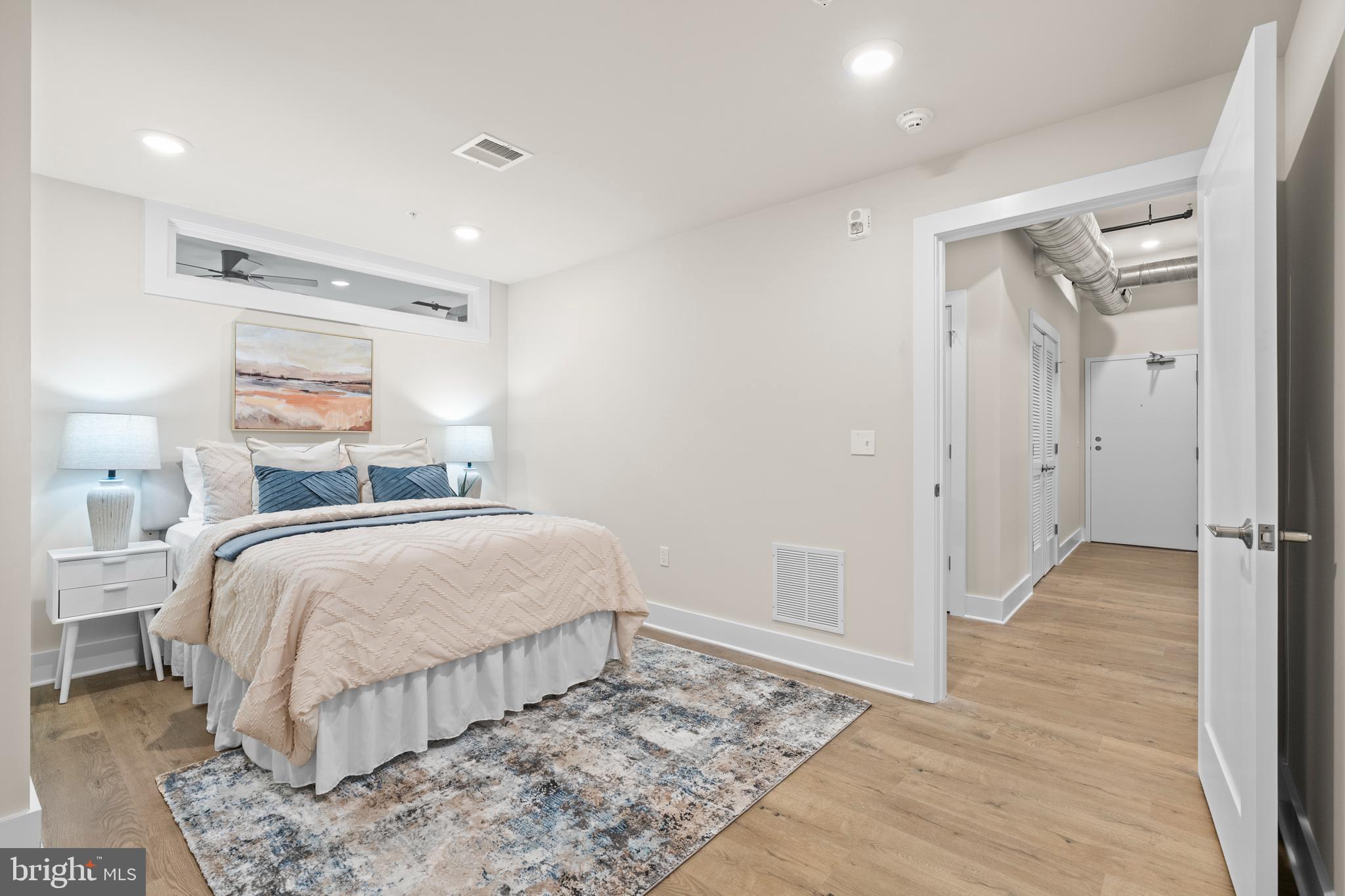 30 West Broad Street Souderton, PA 18964 - Photo 17 of 38 a bedroom with a bed and a walk in closet