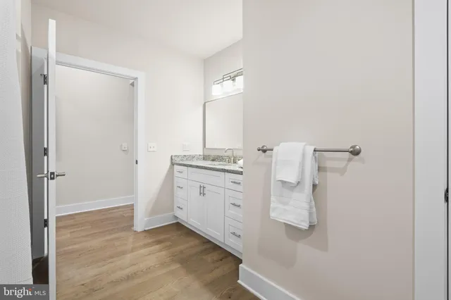 a bathroom with a shower and toilet