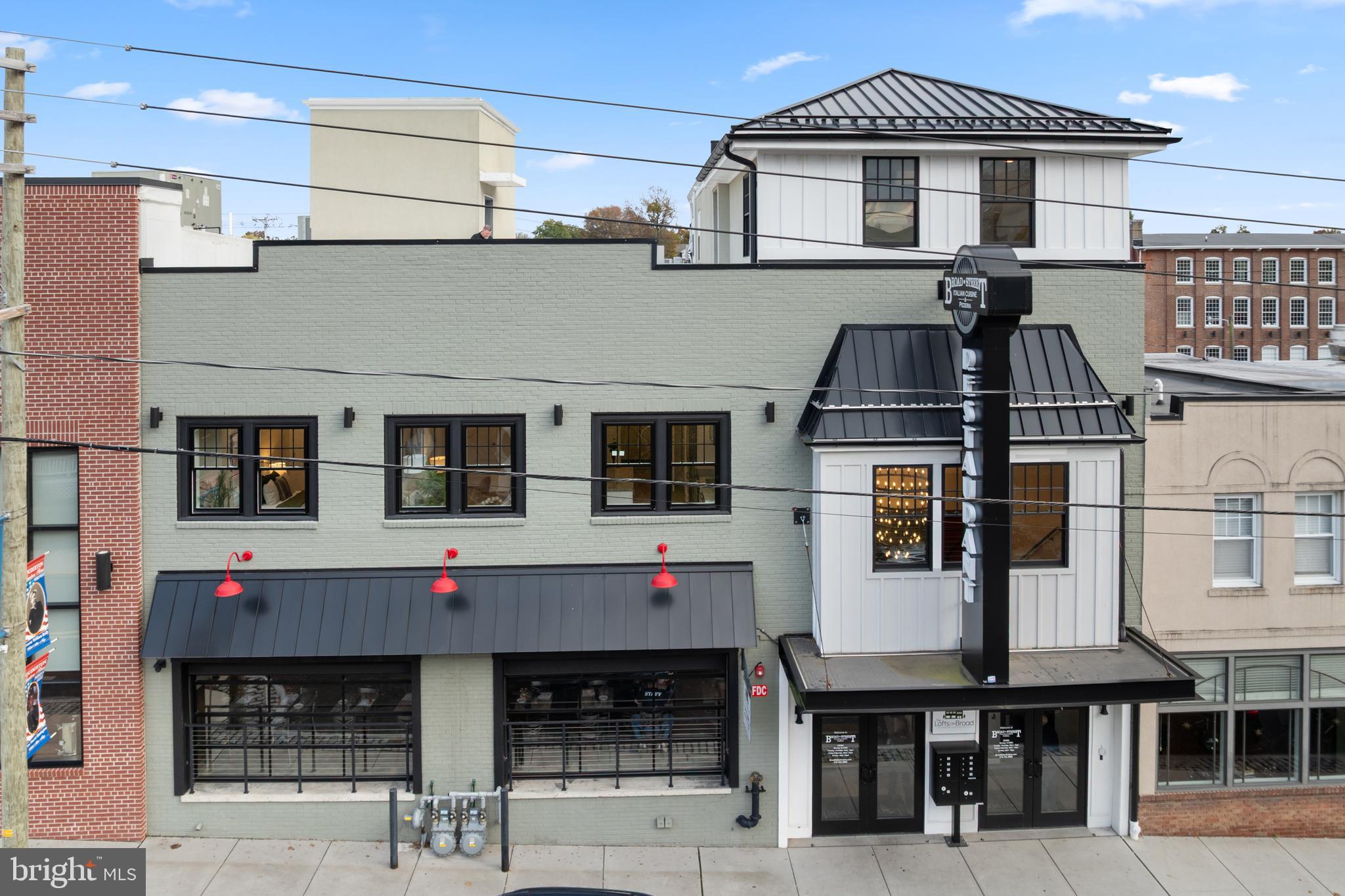 30 West Broad Street Souderton, PA 18964 - Photo 28 of 38 a front view of a house with retail shops