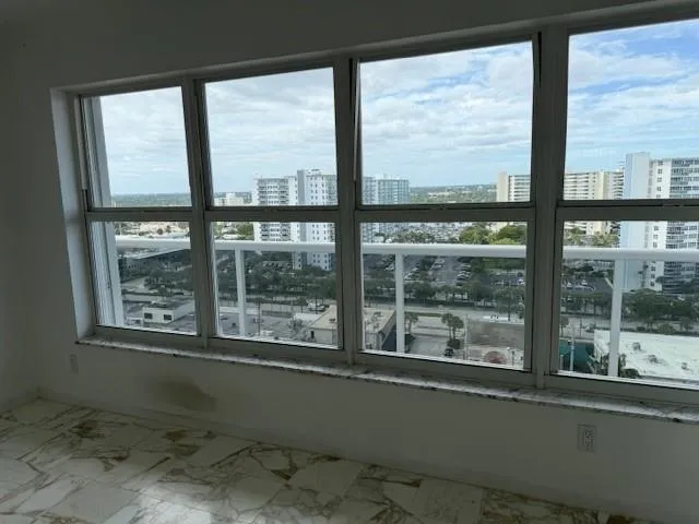 a window in an empty room with a window