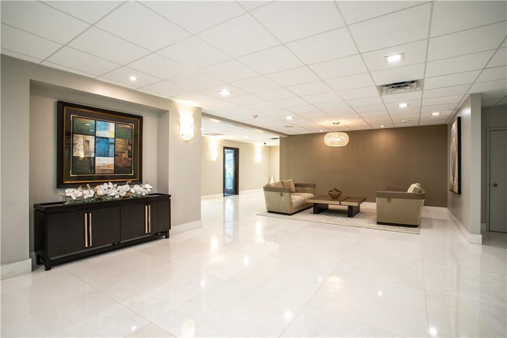 3500 Galt Ocean Drive, Unit 1408 Fort Lauderdale, FL 33308 - Photo 18 of 24 a large bathroom with a large tub and sink