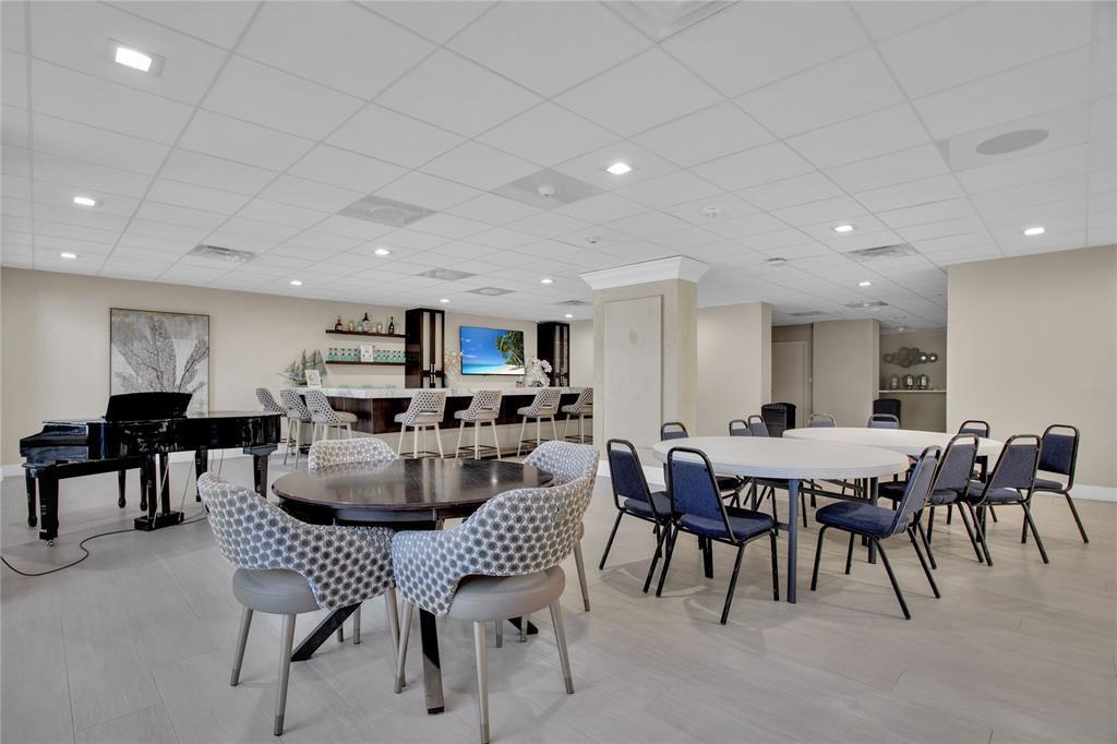 3500 Galt Ocean Drive, Unit 1408 Fort Lauderdale, FL 33308 - Photo 22 of 24 a view of a dining room with furniture